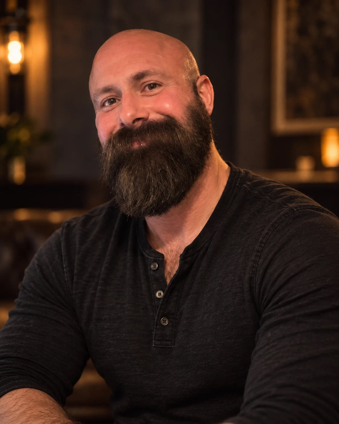 Jarrett, founder of Band of Beards, a bearded man in a dark henley